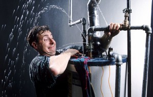 01 Jan 2000 --- Plumbers dilemma --- Image by © David Bentley/CORBIS